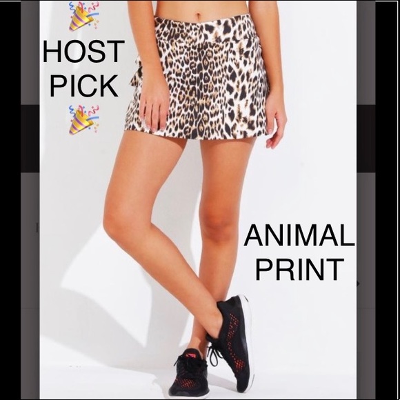 Dresses & Skirts - 💕HP🎉DONA JO ANIMAL PRINT TENNIS/GOLF SHAKIRA RUFFLE SKORT/SKIRT WITH POCKETS